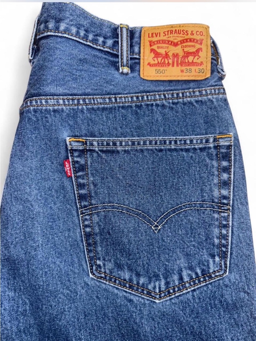 Levi's 550 Men's Relaxed Jeans - Classic Blue Denim with Tan Patch